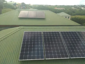 Solar panels on the roof of LambLion Apartments, a Green Globe certified stay in Antigua