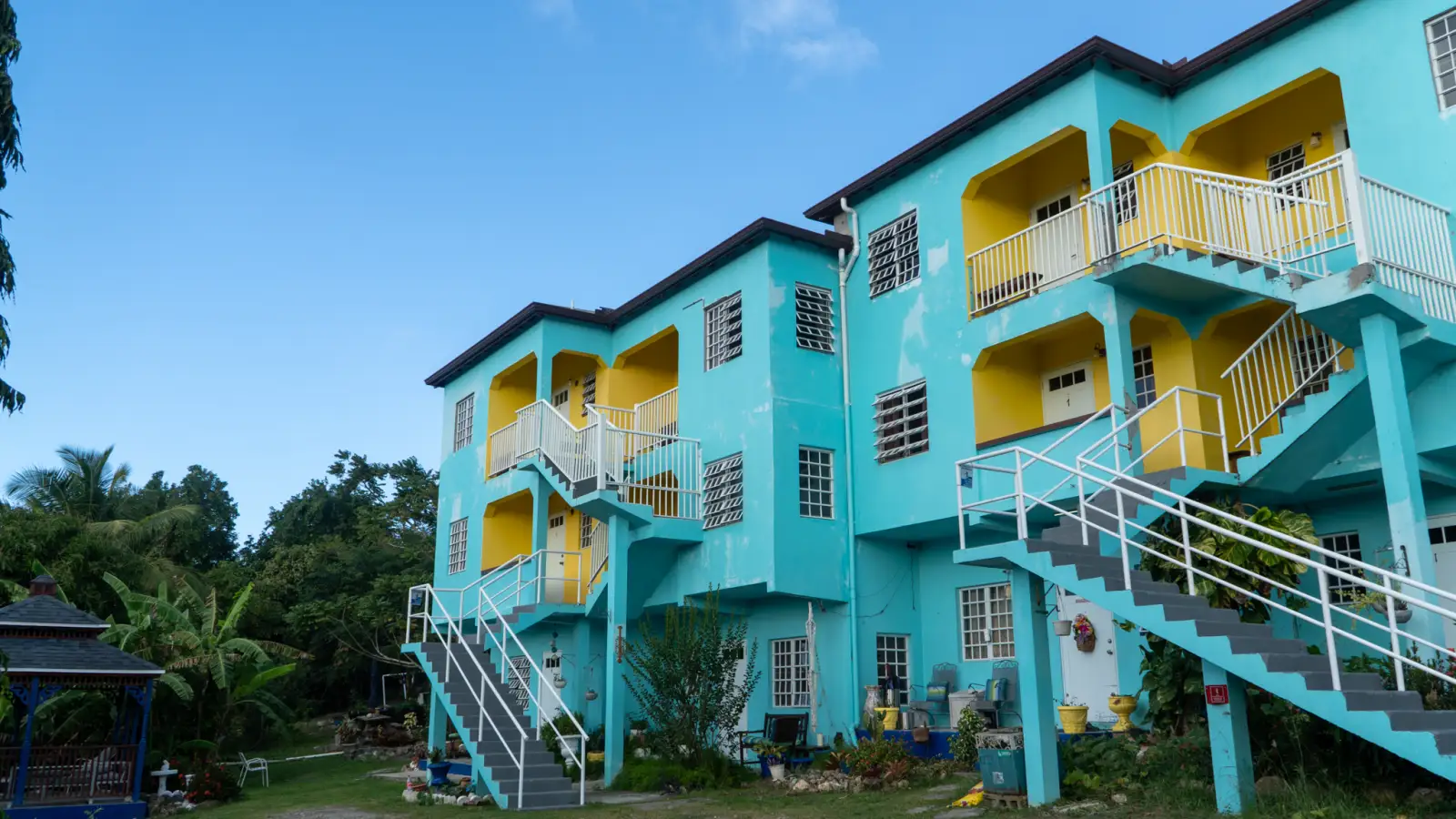 LambLion Apartments in central Antigua under a clear blue winter sky